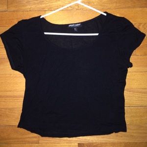 Black short sleeved crop top.