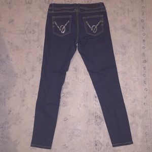 Bebe skinny jeans with stone on back pockets