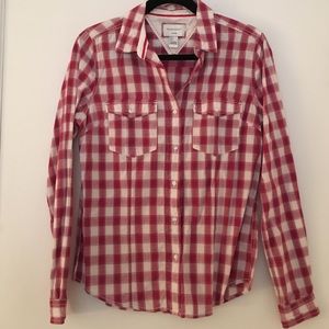 Raspberry colored plaid button up shirt.