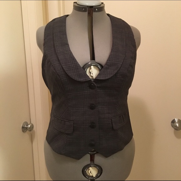 Plaid vest.