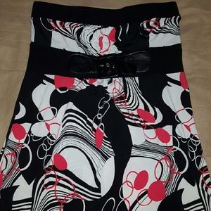 Top with attached belt