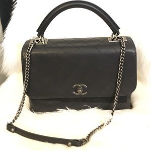 Chanel handle flap bag with cross body chain