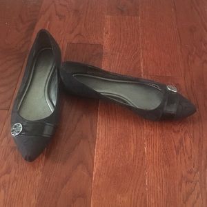 Black coach flats, pointed toe.