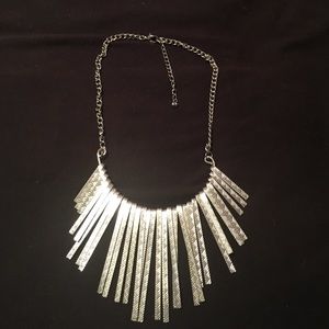 Silver necklace.