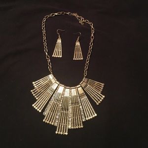 Gold necklace and earring set.