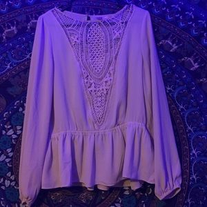 Tan blouse with lace accents