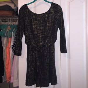 Black Gianni Bini romper with gold detail
