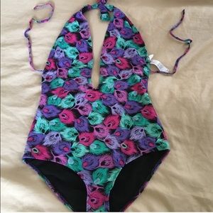 Low cut backless one piece