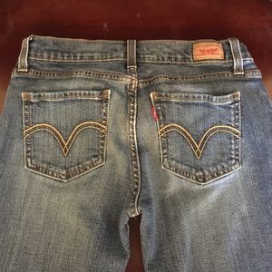 Levis too super low 524 jeans