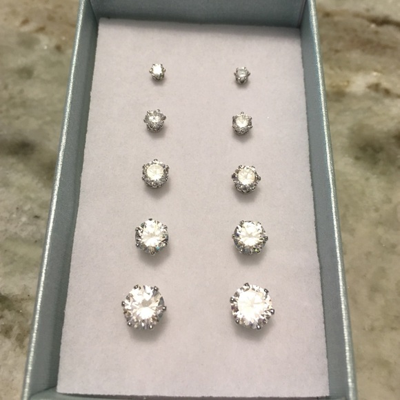 5 pair set graduated diamond silver set studs.