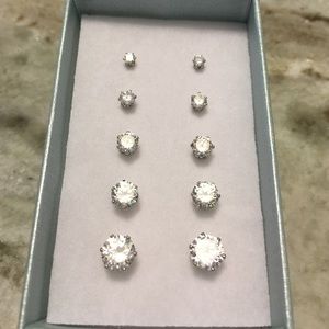 5 pair set graduated diamond silver set studs.