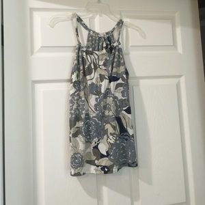 Small floral shirt.