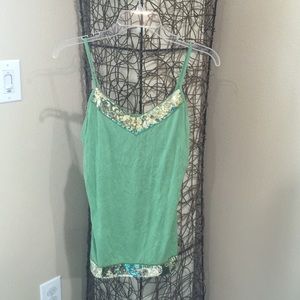 Green shirt with gold sequins