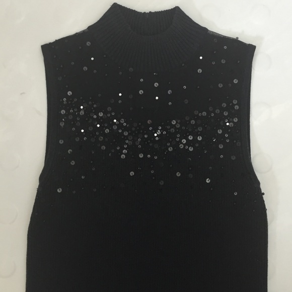 Dressy top, sleeveless.