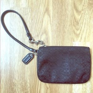 black COACH wristlet