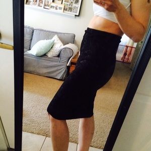 Knit pencil, patterned black skirt.