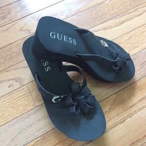 Guess wedge flip flops size 7