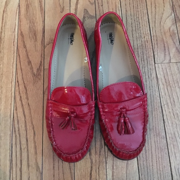 Bright shiny red loafers