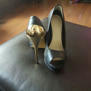 Peep-toe platforms gold heel. Worn once.