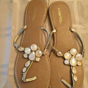 Cabrizi sell embellished flat sandals