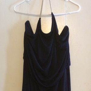 Blue jump suit with gold toned necklace neckline