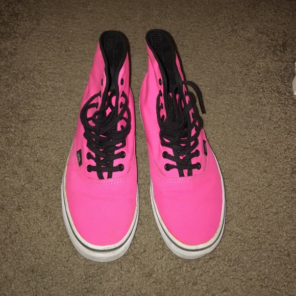 Neon pink high top vans