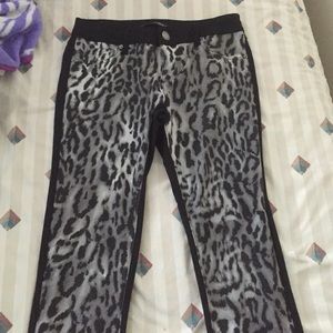 Black leopard skinnys