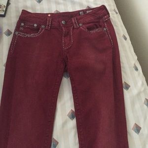 Burgundy skinny jeans
