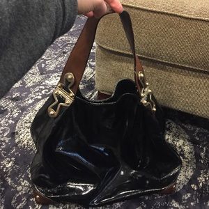 Black patent Michael kors tote with brown hardware