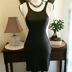 Form fitting dress by C. Graffiti