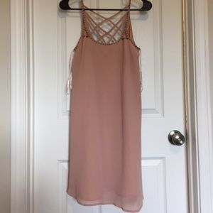 Blush colored dress.