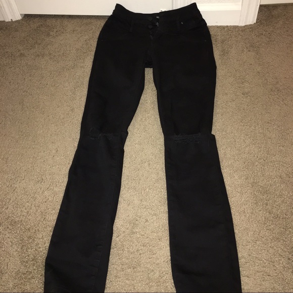 Knee ripped black high waisted jeans