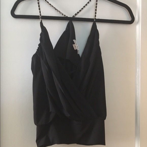 Black going out top