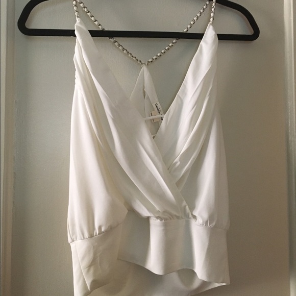 White top with gold detail
