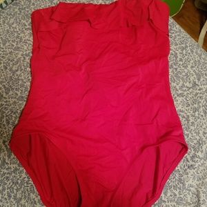 Red one piece swim suit.