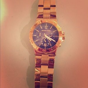 Michael Kors rose gold watch with blue face