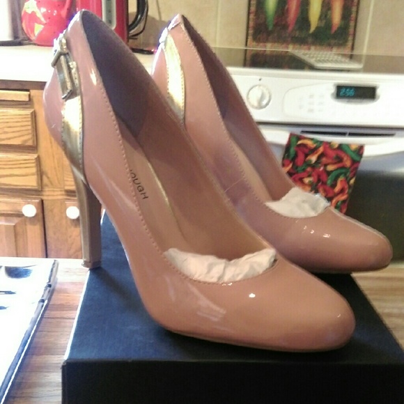 Pink patent with Gold accent heels. Worn 3x. 9M