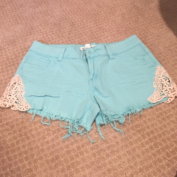 Like new light blue jean shorts with lace