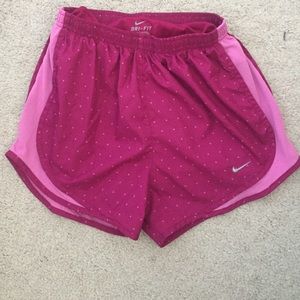pink triangle nike shorts
