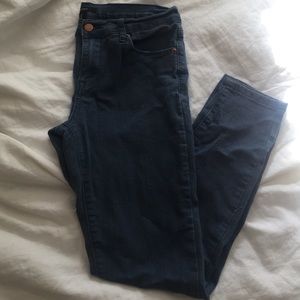 Faded light blue jeans