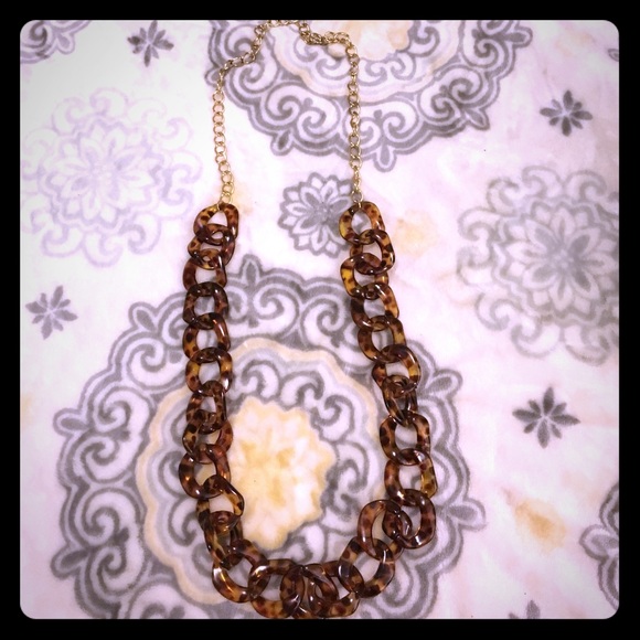 Plastic tortoise and gold chain long necklace
