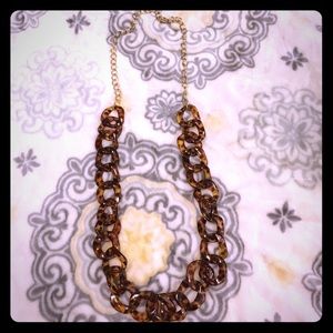 Plastic tortoise and gold chain long necklace