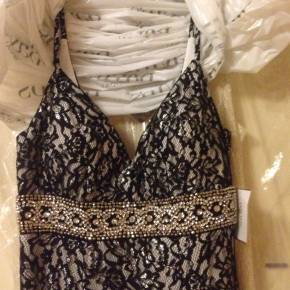 A mermaid styled black and white prom dress - Picture 2 of 3