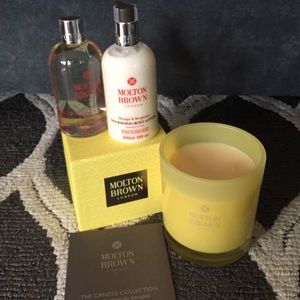 Molton Brown candle, body wash, and lotion set.