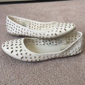 Punched out white flats