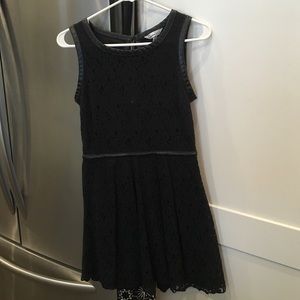 Black dress with floral designs.