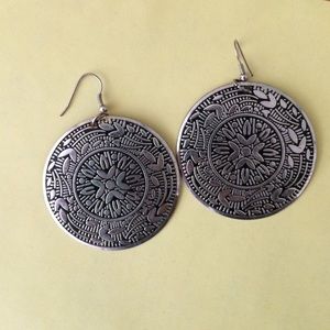 Large silver medallion earrings