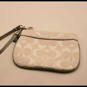 Coach white and silver wristlet