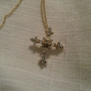 14 kt gold and diamond cross pendant