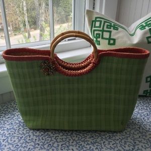 Straw bag with vintage brooch